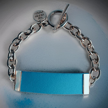 Load image into Gallery viewer, Baby Blue Leather and Chain ID Toggle Bracelet by The Urban Charm
